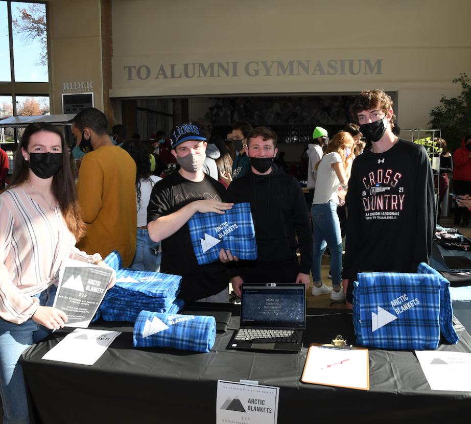 Students sell their products at the Business in Action Market Fair