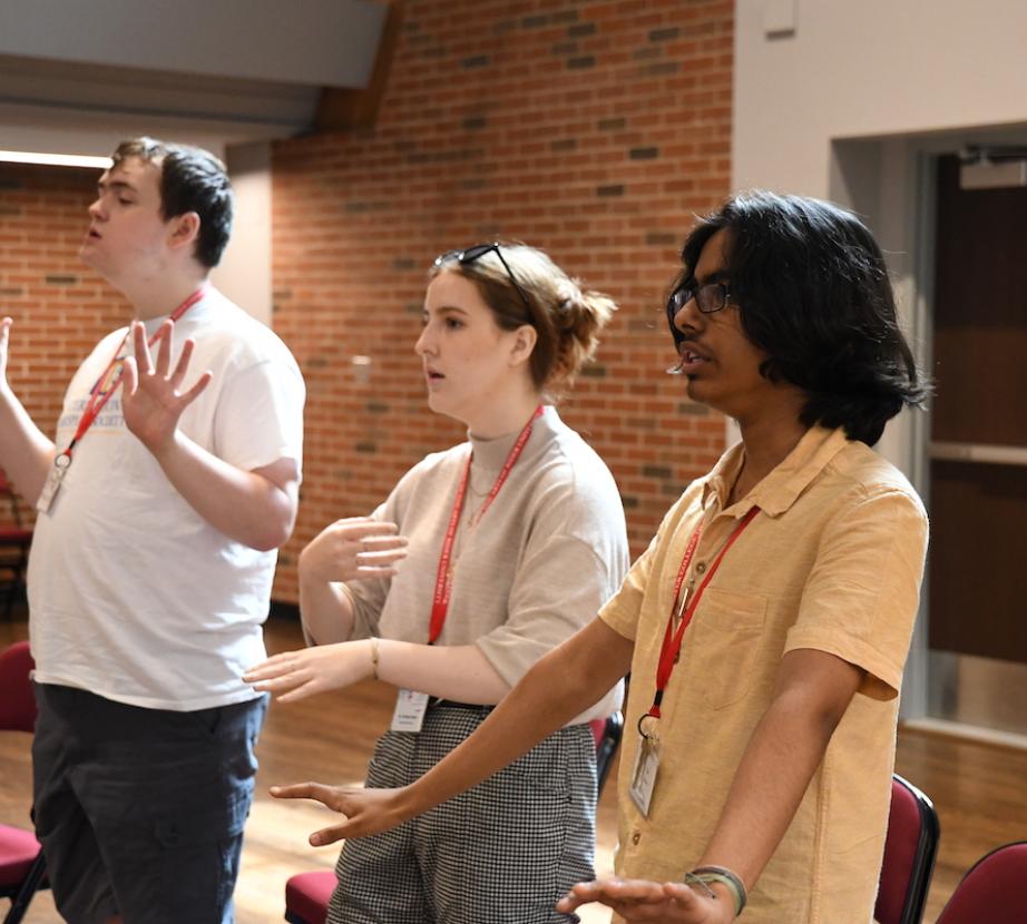 Vocal Institute students warm up.