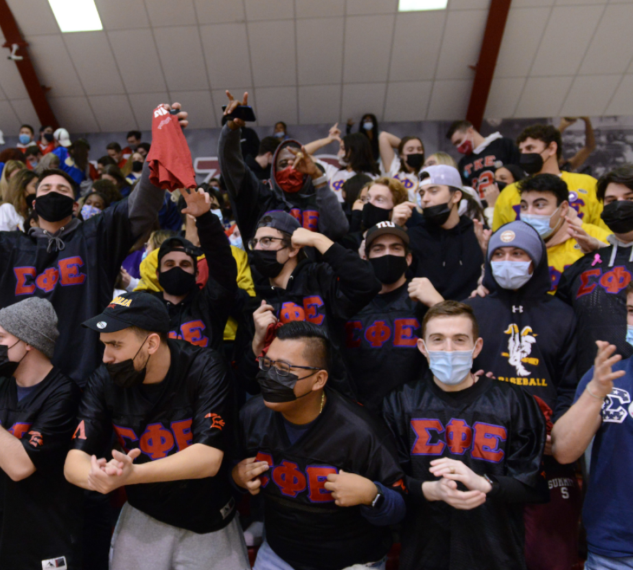 IntraFraternal Council students at a basketball game