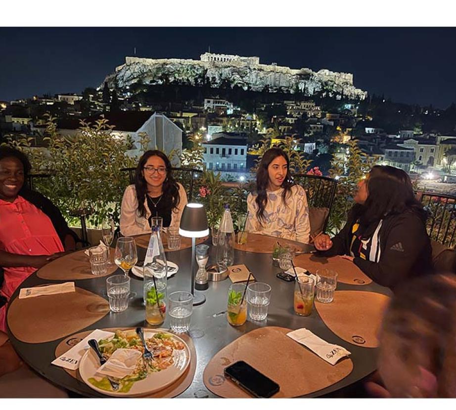 Students eat at restaurant in Greece