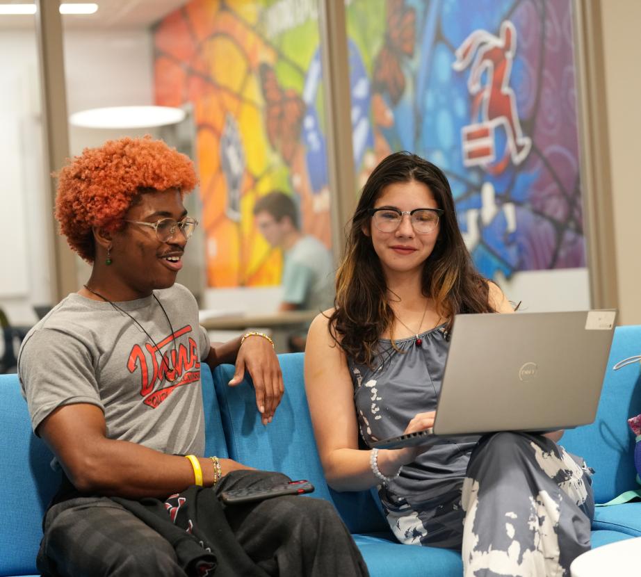 Two students conversing in the Center for Diversity and Inclusion