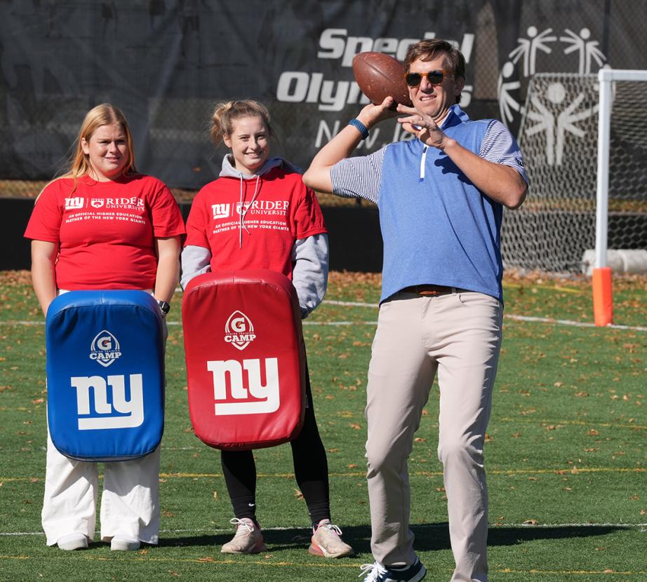 Rider students participate in sports clinic with NY Giants and Special Olympics New Jersey Rider University