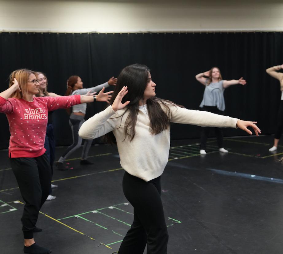 Dance/Movement Therapy students extend their left arms