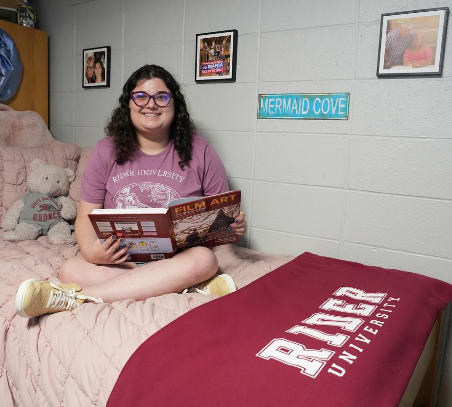 student in dorm room