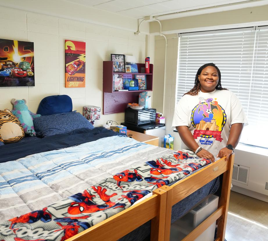 student in dorm room