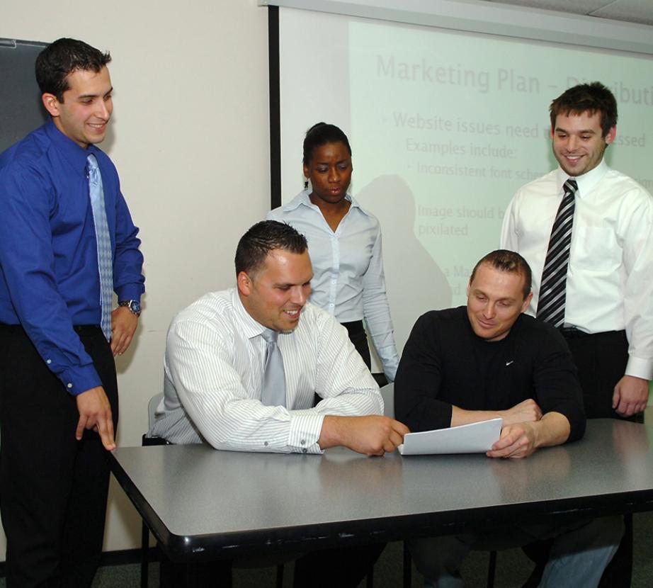 2007 sbi students around a table