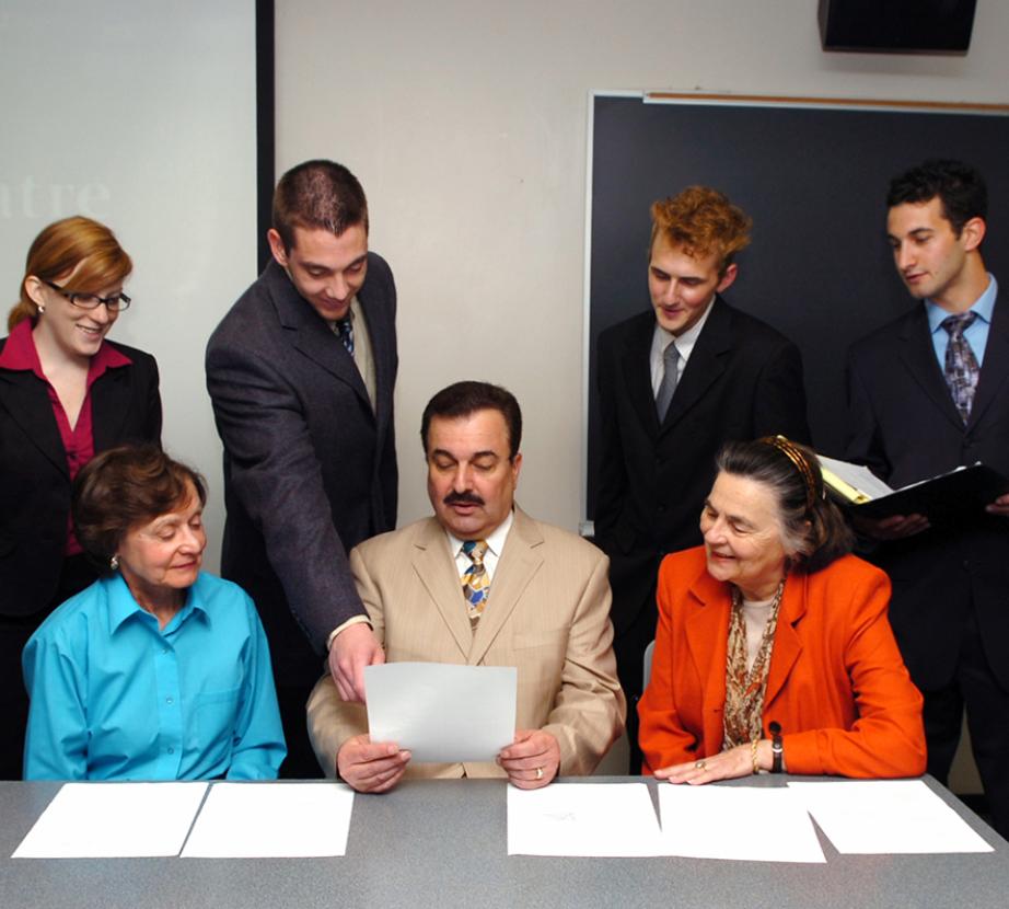 2009 SBI students around a table