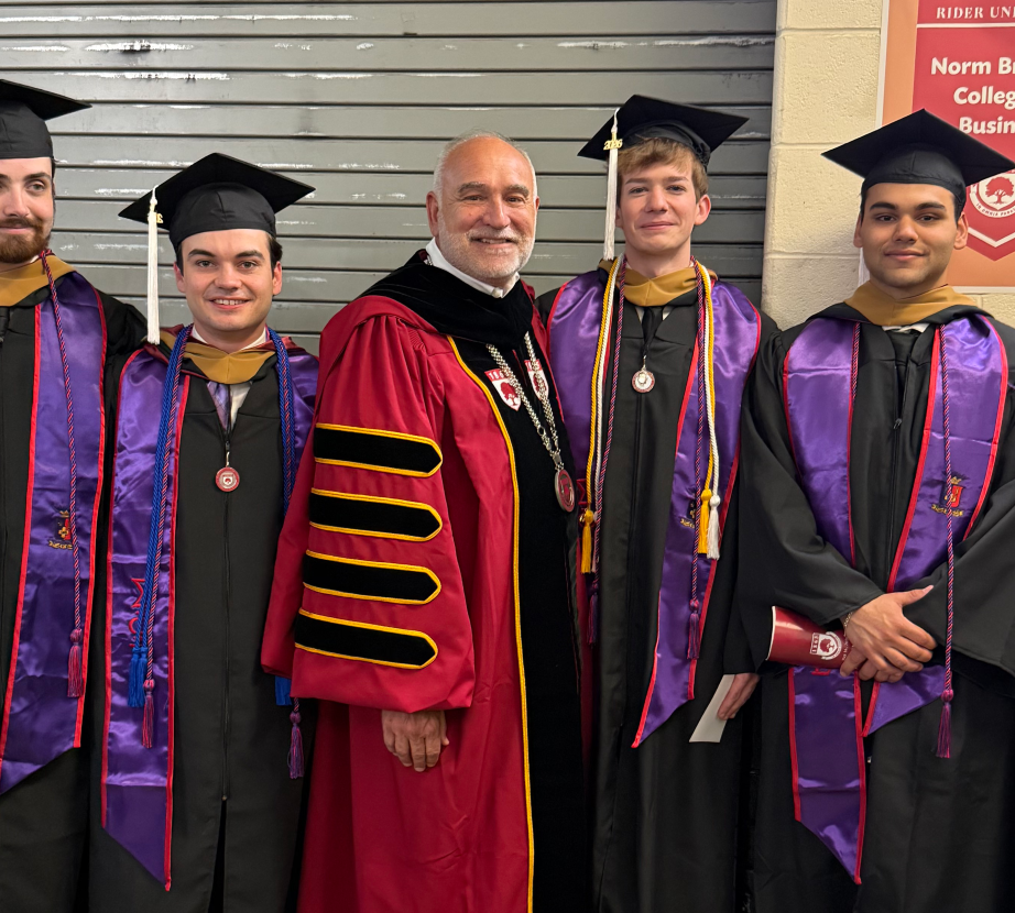 President Loyack and students at Commencement