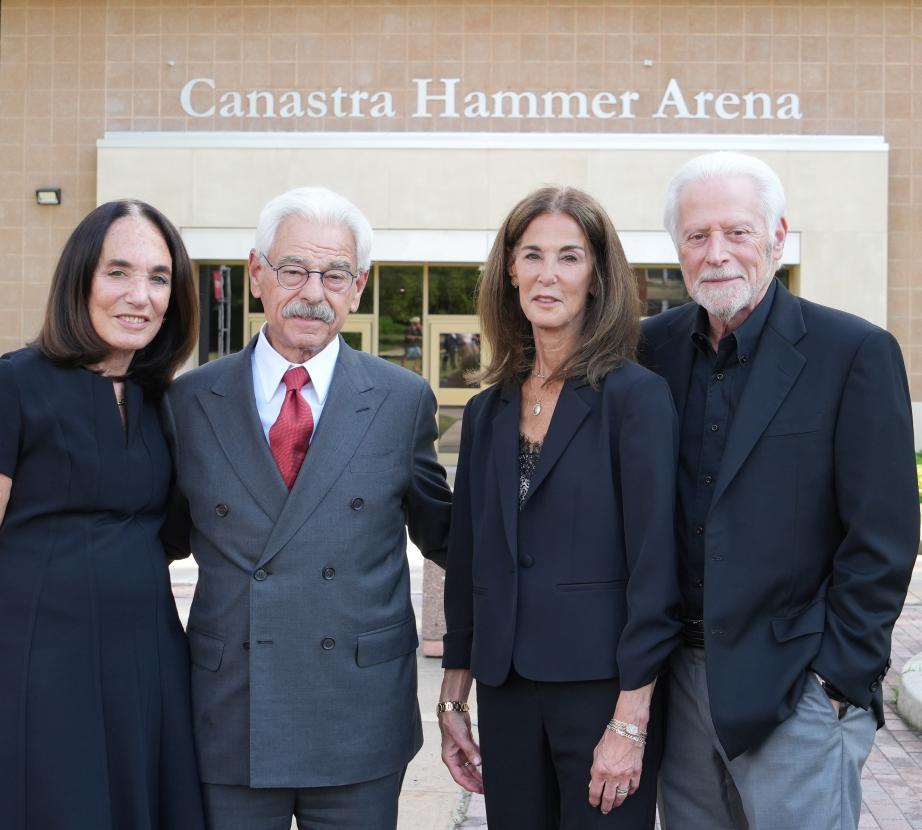 The Canastras and Hammers pose in front of Canastra Hammer Arena
