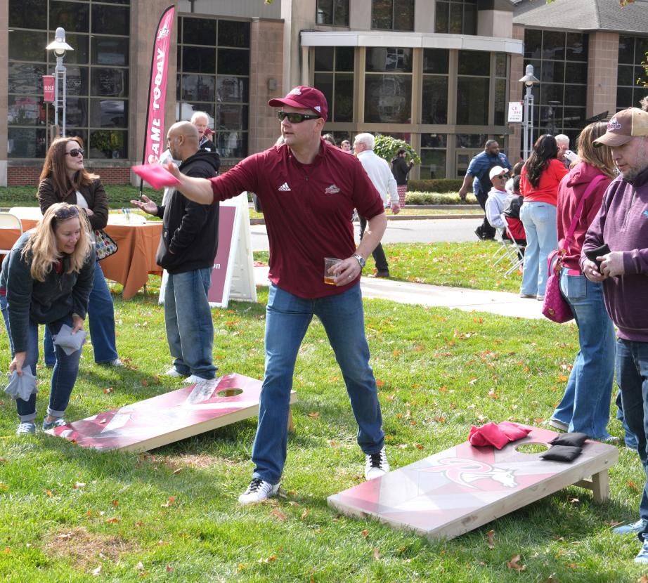 Group plays cornhole
