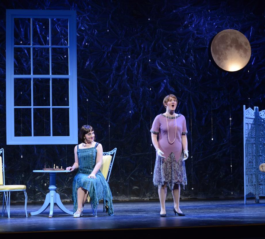Student performs an opera on stage