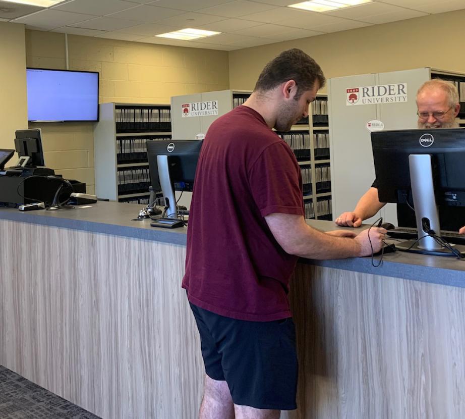 Rider student gets mail at Rider University mailroom