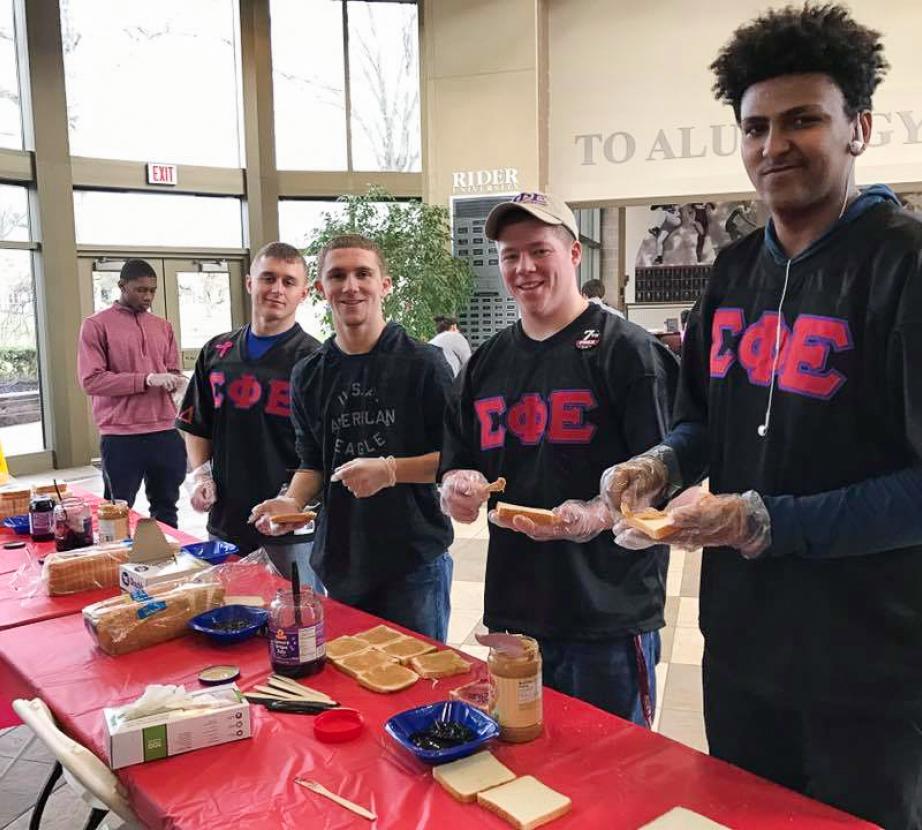 Students make sandwiches together.