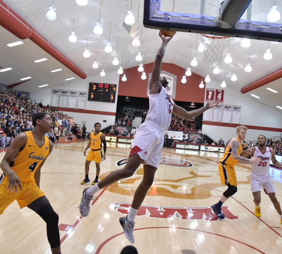 Basketball play in Rider Gym.