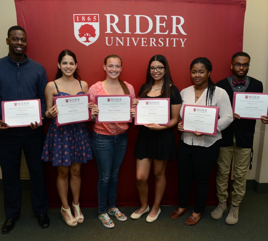 Students pose with awards at EOP Banquet.