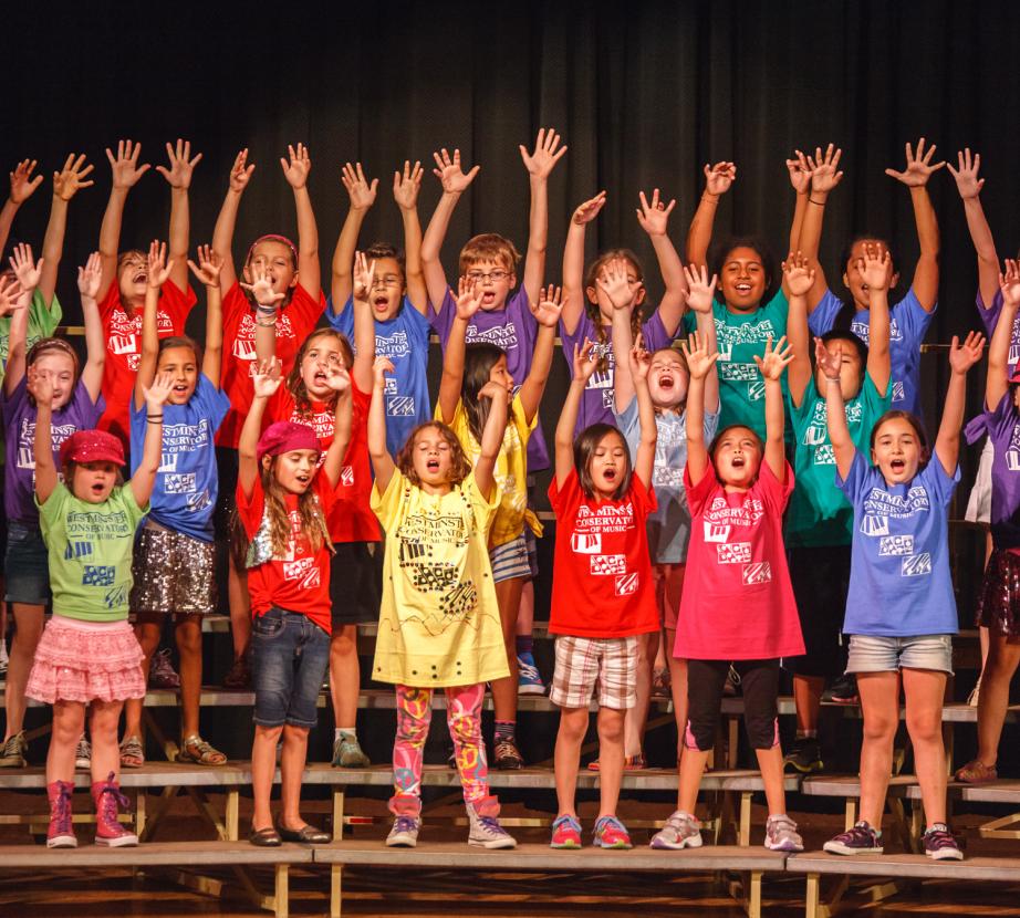 Sing Your Heart Out Students Raising Hands