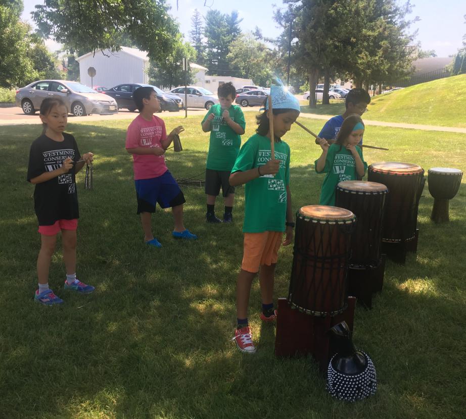 Students playing drums