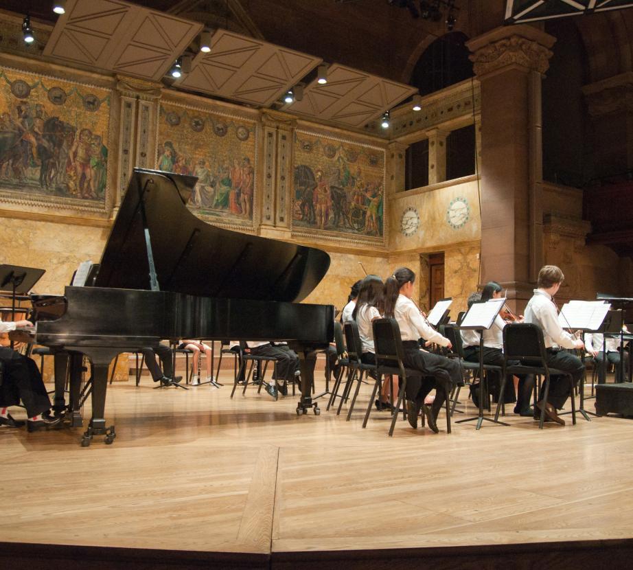 Students in an orchestra