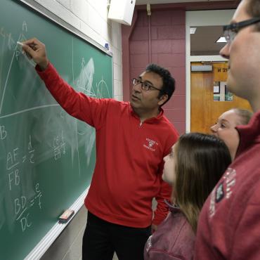 Rider students with math professor