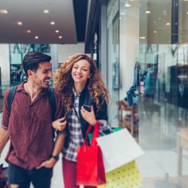 Young adults shopping at the mall.
