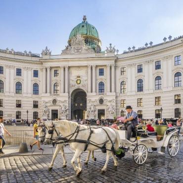 Austrian building and horse drawn carriage