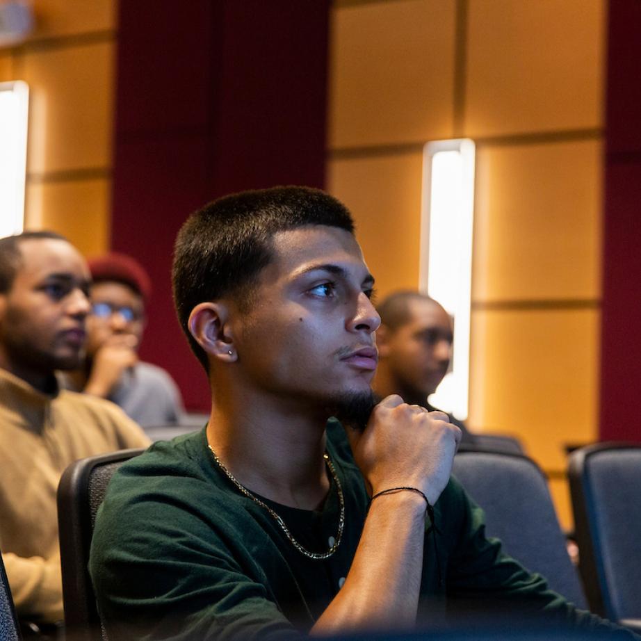 Student attentively watching a presentation