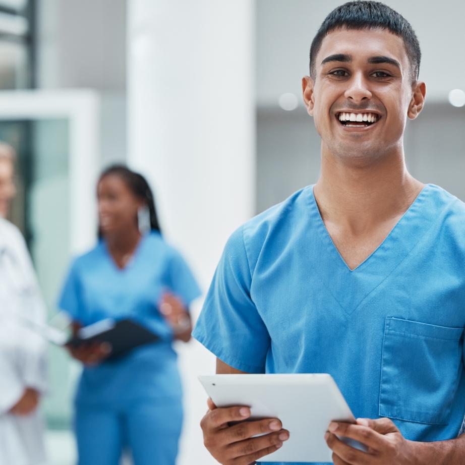 Male nurse smiling at camera