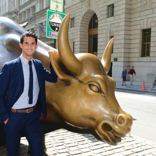 Student with the Charging Bull in NYC