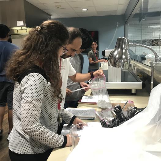 STEM Summer institute students conduct experiment in teaching kitchen