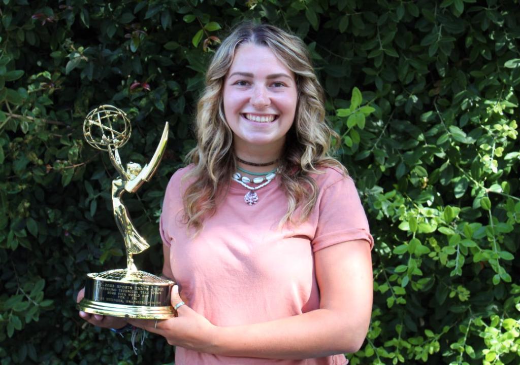 Kaylee Ettinger holding Emmy Award