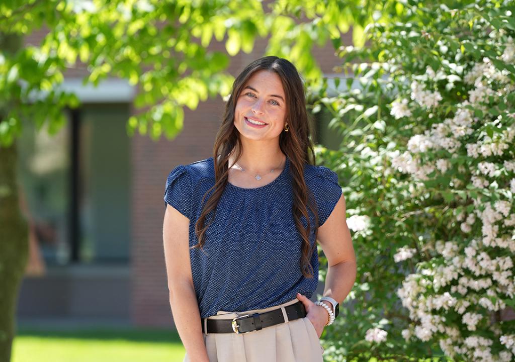 Allison Stewart poses for picture on campus